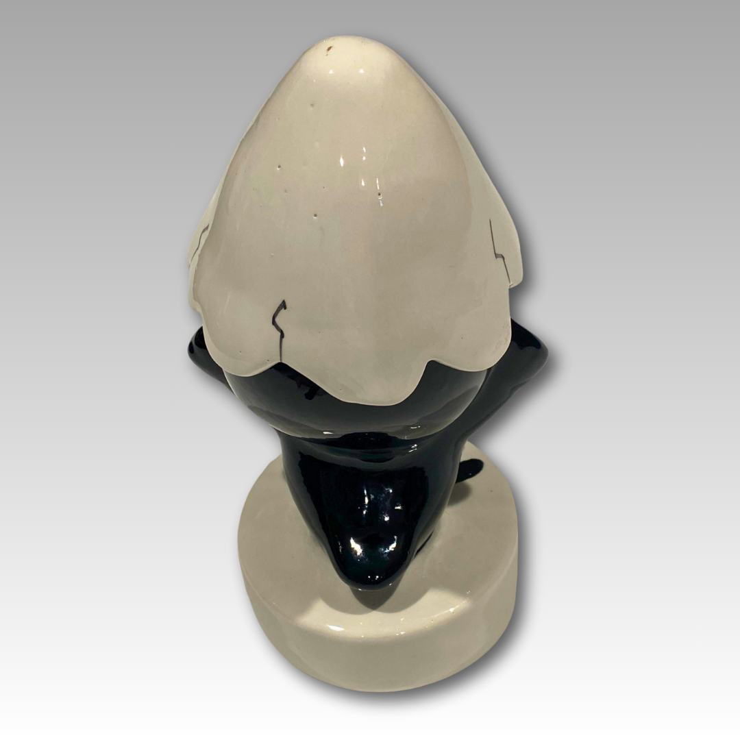 Retro della statuetta Calimero in ceramica