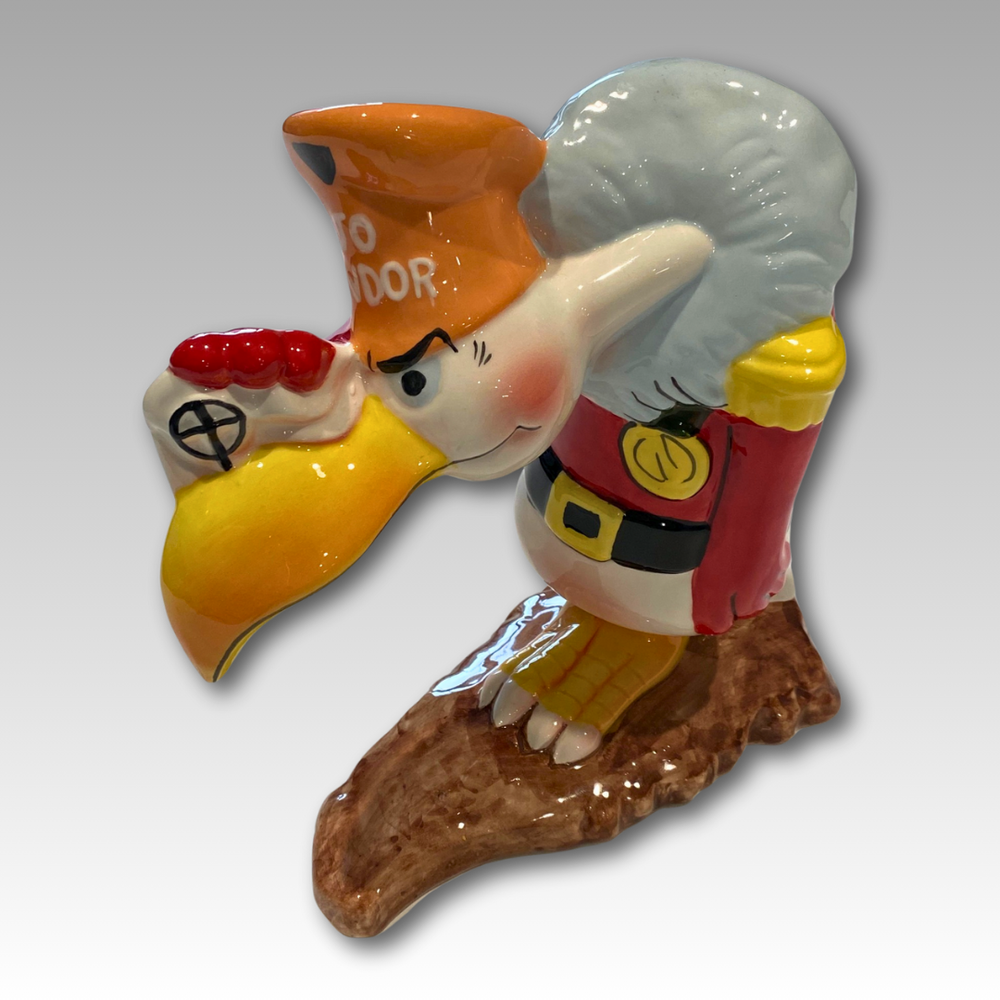 Statuina in ceramica Joe Condor su base marrone