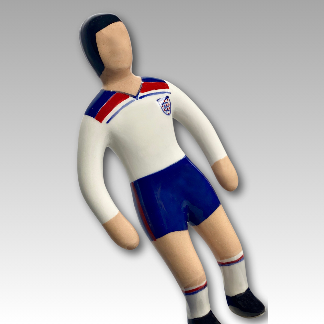 Statuina ceramica Subbuteo bianca e blu inclinata