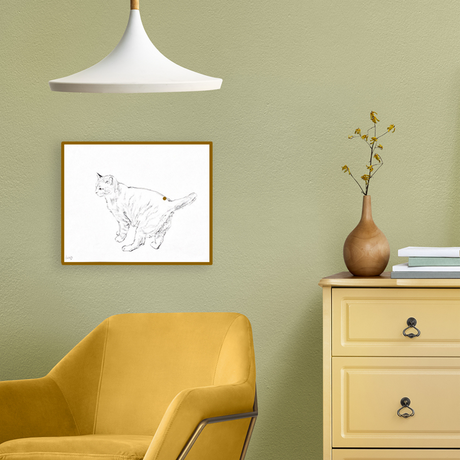 Bozzetto originale di gatto incorniciato su parete verde