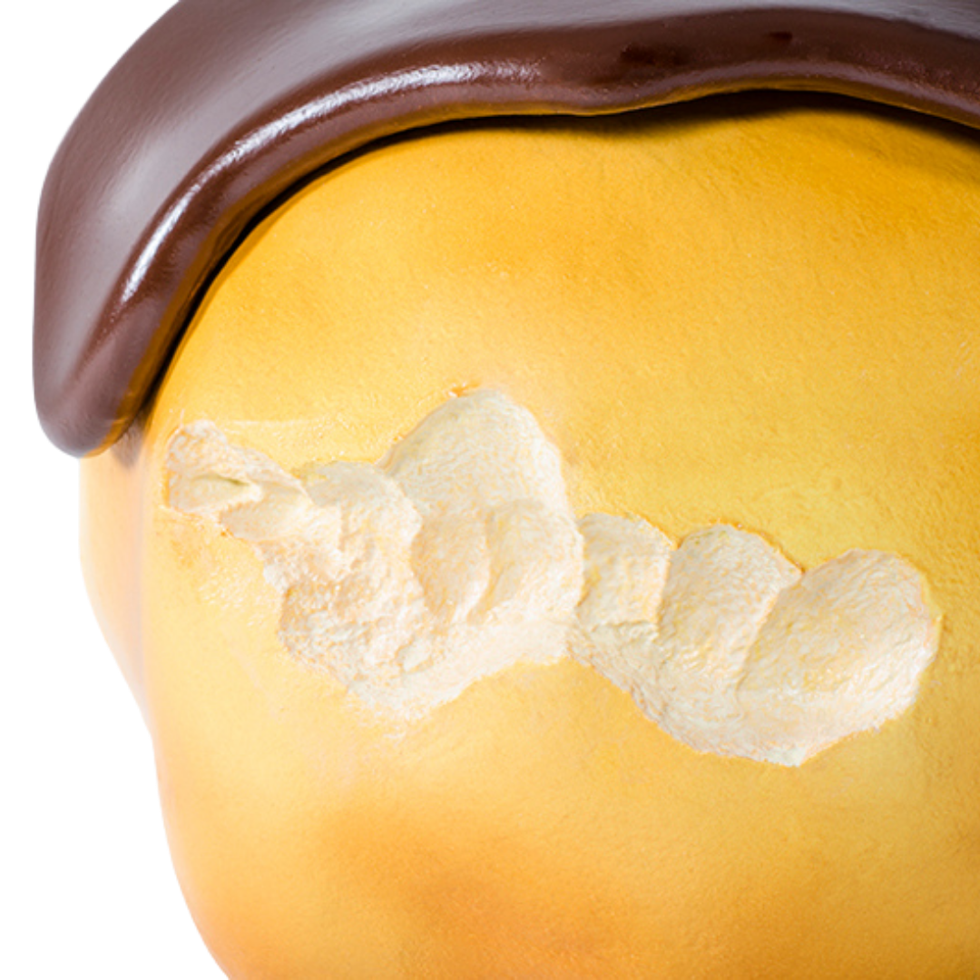 Dettaglio del pouf Big Eat Bignè con glassa al cioccolato