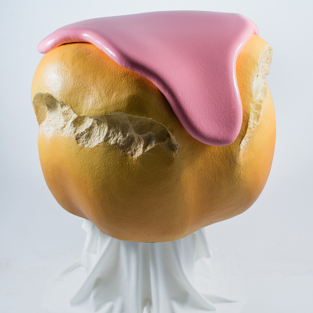 Pouf Big Eat Bignè rosa su piedistallo