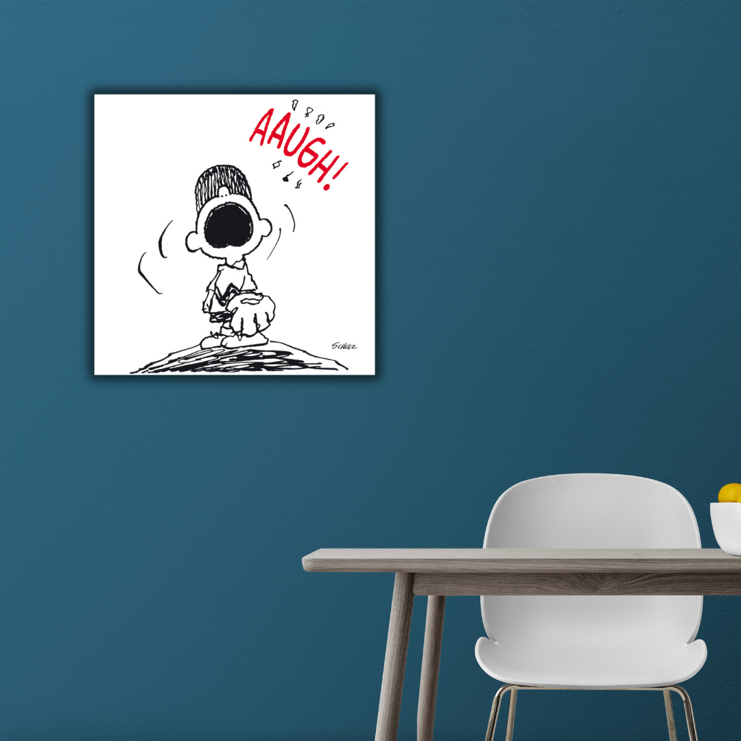 Quadro Charlie Brown Aaugh su parete blu in sala da pranzo