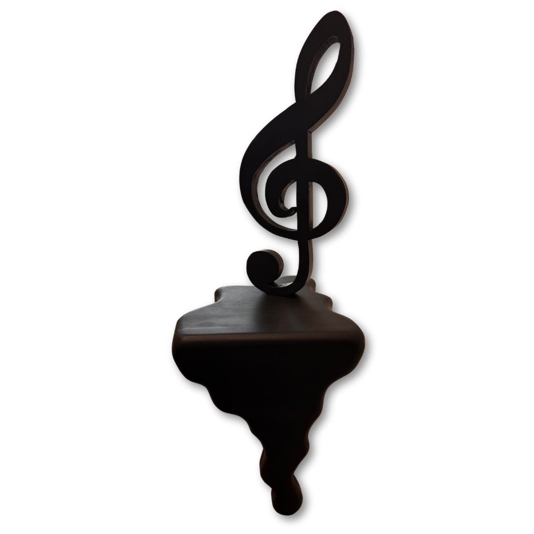 Scultura in legno nero a forma di chiave di violino fusa verso il basso, firmata GianTarlo, altezza 30 cm, opera d'arredo artistico artigianale unica e moderna.