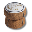 Dettaglio di pouf artigianale a forma di tappo di champagne